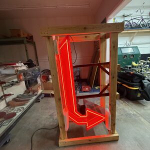 double-sided neon arrow sign